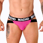 Jockstrap homme anatomique lycra rose fuchsia logo Macho, vue de face sur modele, pochette moulante mettant en valeur la silhouette lanieres elastiques cuisses nues tatouees
