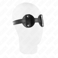 Baillon mors souple presente sur un mannequin de tete blanc vu de profil, la sangle en cuir entoure le crane pour montrer le port reel de l'accessoire.