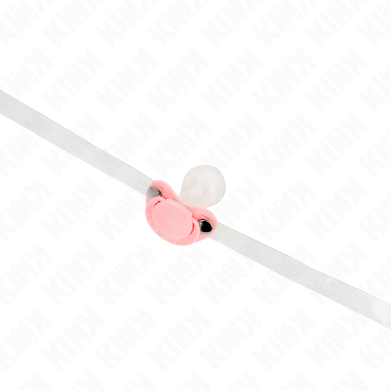 Bâillon sucette rose en silicone traversé par sa lanière transparente réglable, vu en angle, petit accessoire BDSM doux pour imposer le silence en douceur.
