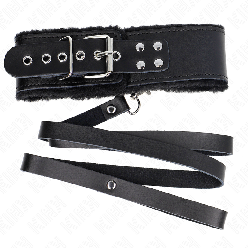 Collier en cuir noir avec longue laisse — détail texture surface