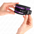 Manchette de poignet noire a bordure violette tenue a deux mains, fermeture pression, format reglable pour des jeux d'attache au rendu raffine.