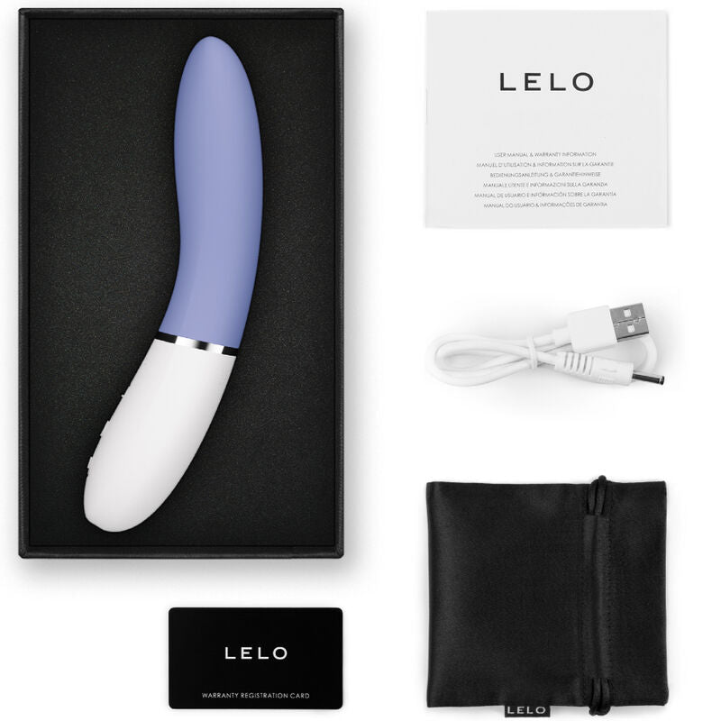 Coffret Lelo Liv 3 bleu lavande ouvert avec notice, cable USB, carte garantie et pochette, vibromasseur point G connecte en silicone.