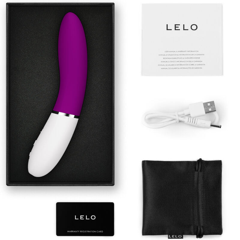 Coffret Lelo Liv 3 violet vif ouvert avec notice, cable USB, carte garantie et pochette satin, vibromasseur point G connecte en silicone.