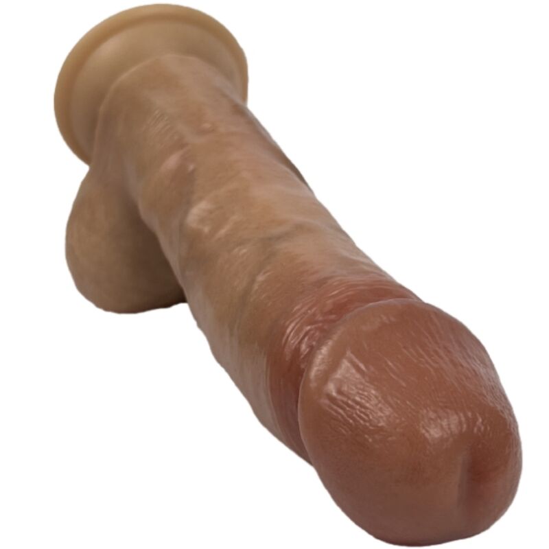 Gode réaliste Silexd Modèle 2 caramel posé à plat : gland marqué, long fût veiné, testicules moulés et base ventouse visible. Silicone double densité Silexpan, 21,5 cm.