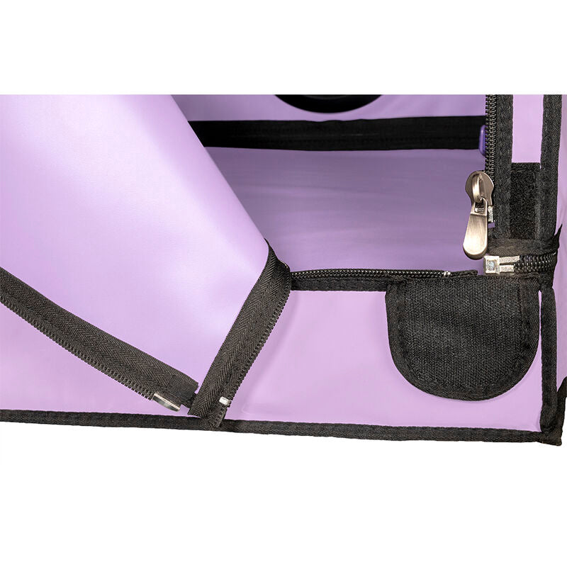 Detail d'un angle interieur de la cabine Secret Dome violette, fermeture eclair, anneau d'attache et poche de rangement sur la paroi lilas