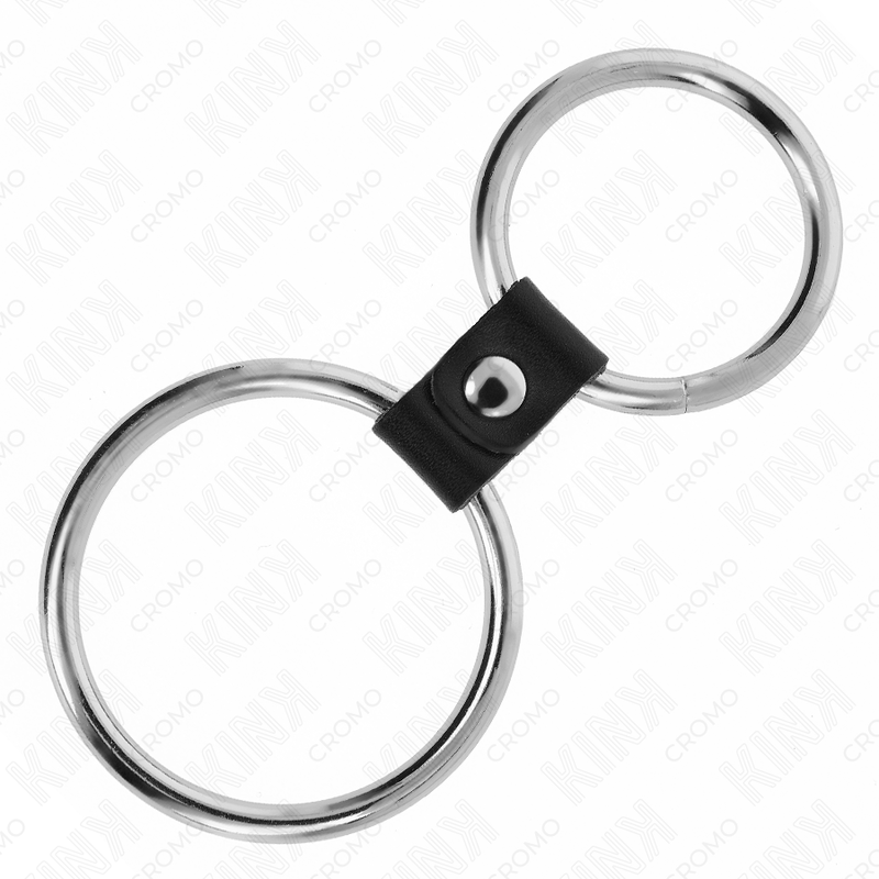 Double anneau pénis en métal relié par sangle en cuir — vue de dos
