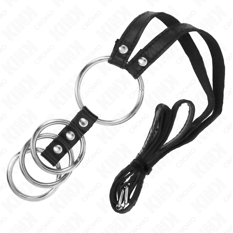 Anneaux pénien métal avec ceinture cuir — détail texture surface