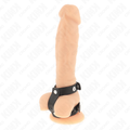 Harnais cuir a sangles cloutees porte autour d'un sexe masculin sur ventouse, cockring testiculaire BDSM, vue de face