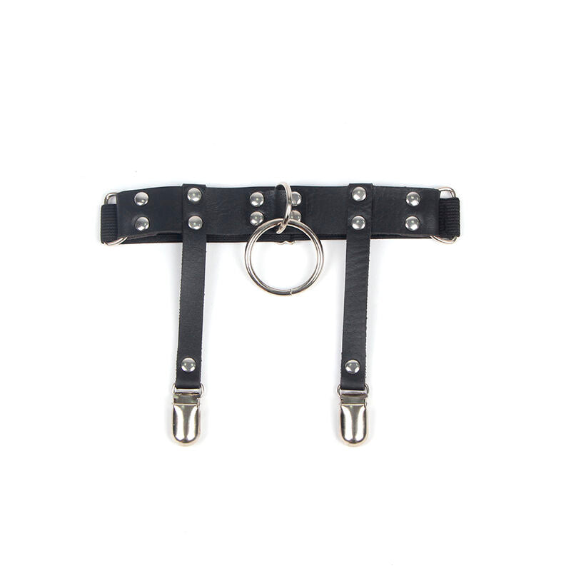 Harnais de jambe en cuir noir Subblime pose a plat, double sangle cloutee, anneau metal central et pinces jarretelle, accessoire fetichiste taille unique.