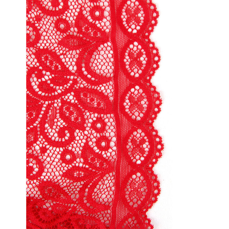 Gros plan sur la dentelle florale rouge ajouree du teddy Subblime, revelant le motif fleuri festonne et la transparence de la maille fine.