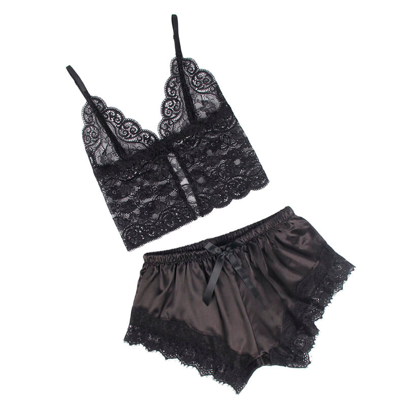 Ensemble lingerie noir Subblime presente a plat, bralette dentelle florale et short satin a noeud, parure deux pieces coordonnee sur fond blanc.