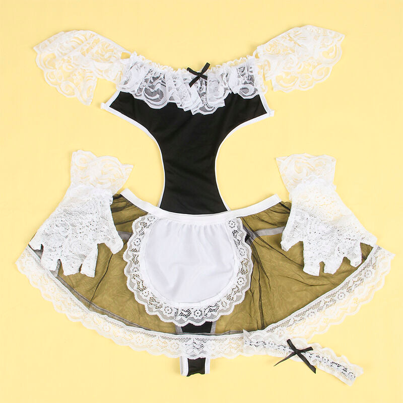 Photo produit a plat du costume de soubrette Subblime noir et blanc, robe a plastron, col et tablier en dentelle disposes sur un fond jaune uni lumineux.