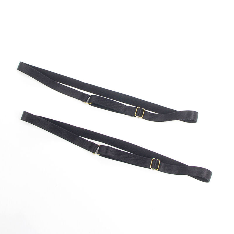 Paire de jarretieres de cuisse en elastique noir a boucles reglables de la nuisette wetlook Subblime, posees a plat sur fond blanc.