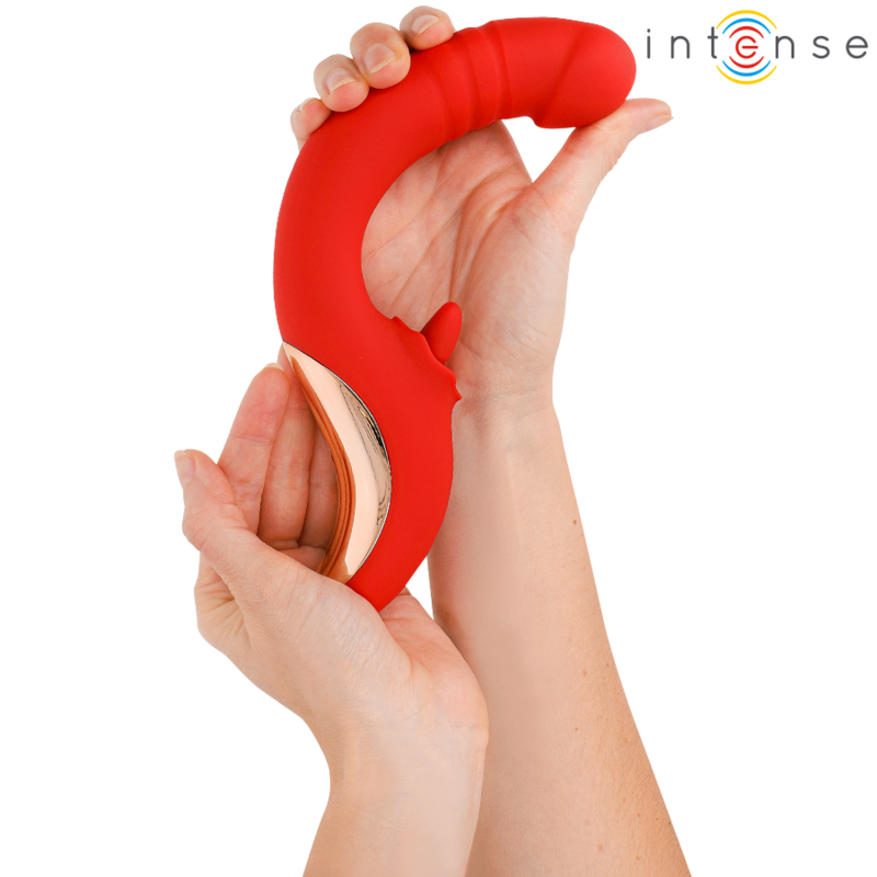 Stimulateur Paulina tenu entre deux mains pour montrer sa flexibilité, doublure dorée visible sur la face interne