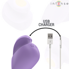 Gros plan sur le dessous du stimulateur Ursula avec marquage CE, port de charge USB et câble fourni