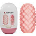 Lot d'oeufs masturbateurs Seductive Golf, etui blanc et rose avec un oeuf chair a texture en relief alveole, gaine extensible en TPR souple.