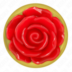 Plug anal métal orné d'une rose rouge — détail texture surface