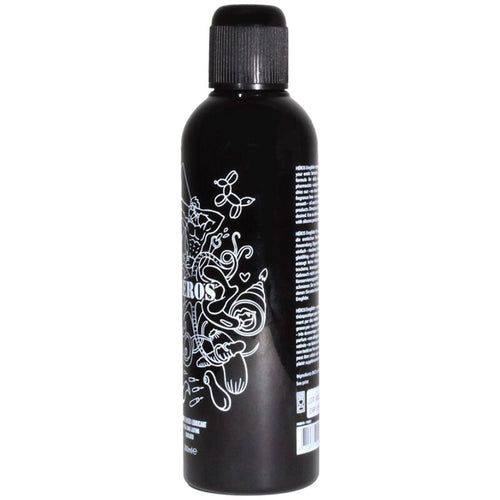 Bouteille noire Heros lubrifiant silicone vue de dos avec mentions legales et texte produit en blanc, format compact a bouchon, glisse longue duree inodore.