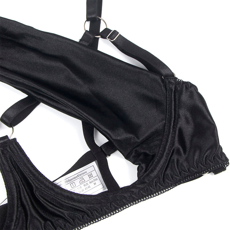 Detail rapproche des sangles satin et de l'etiquette de taille du soutien-gorge ouvert Subblime, finition reglable, vue produit sur fond clair.