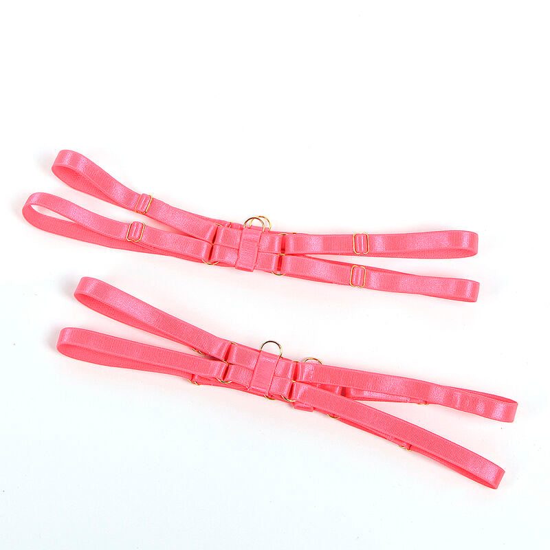 Paire de jarretieres de cuisse en elastique rose fluo a boucles dorees de l'ensemble Subblime, posees a plat sur fond blanc.