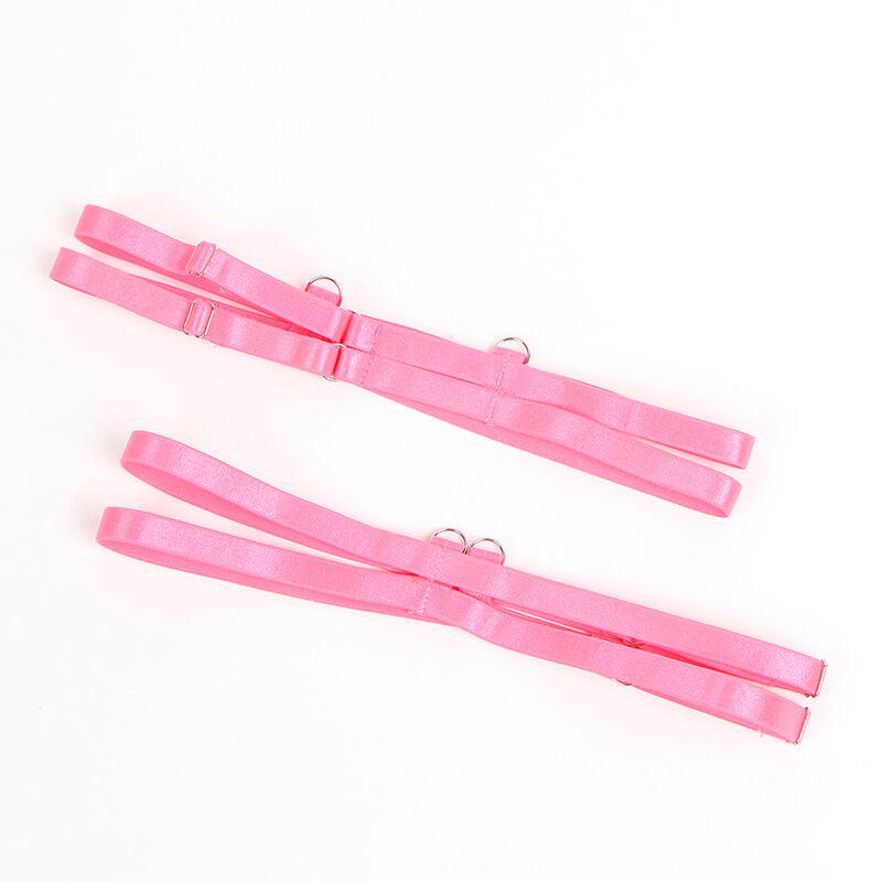 Liens jarretelles de cuisse roses à anneaux métal de l'ensemble lingerie Subblime présentés seuls, accessoires décoratifs en sangle élastique soyeuse.