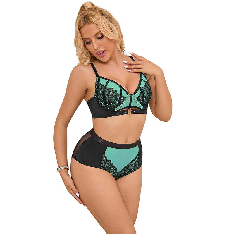 Modele de trois quarts en parure noire et turquoise Subblime, soutien-gorge dentelle florale et culotte taille haute, ensemble lingerie glamour decor clair.