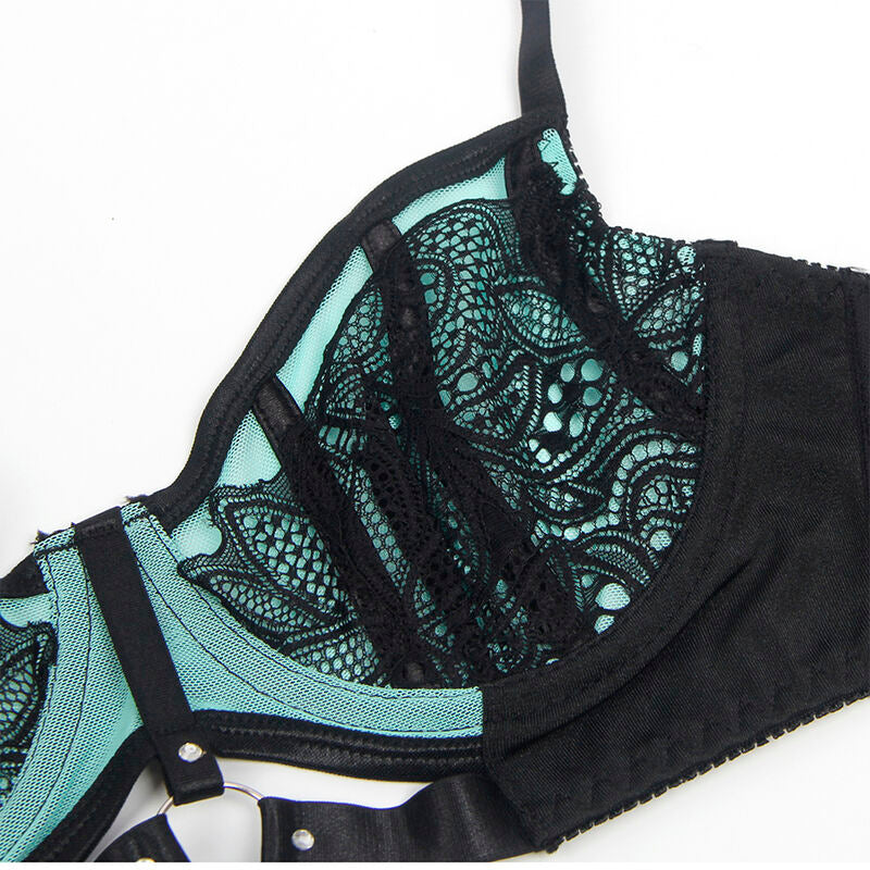 Gros plan sur la dentelle florale vert d'eau et les armatures du soutien-gorge Subblime, detail textile de la parure aux empiecements resille noirs.
