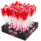 Presentoir Eat Me de sucettes rouges moulees en forme de sexe feminin, friandises comestibles coquines Secret Play, cadeau gag pour soirees festives.