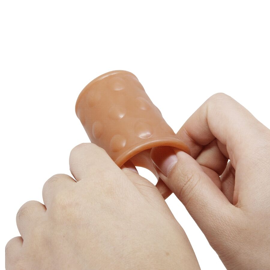 Manchon pénis avec plug anal