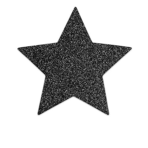Cache-teton Bijoux Indiscrets en forme d'etoile noire pailletee, gros plan sur une unite scintillante reutilisable et autocollante pour sublimer un decollete audacieux.