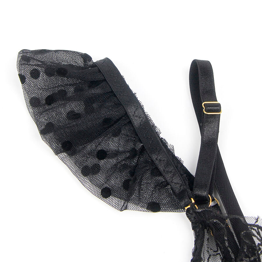 Porte-jarretelles dentelle noire Subblime a plat, volants en maille a pois et sangles ajustables a boucles dorees, element d'une parure lingerie raffinee.