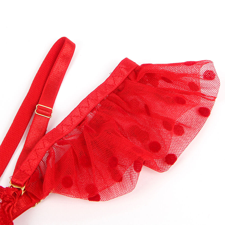 Porte-jarretelles rouge Subblime a plat, volants en maille a pois et sangle ajustable a boucle doree, element d'une parure lingerie raffinee.