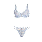Ensemble dentelle brodée florale bleu ciel — détail texture surface