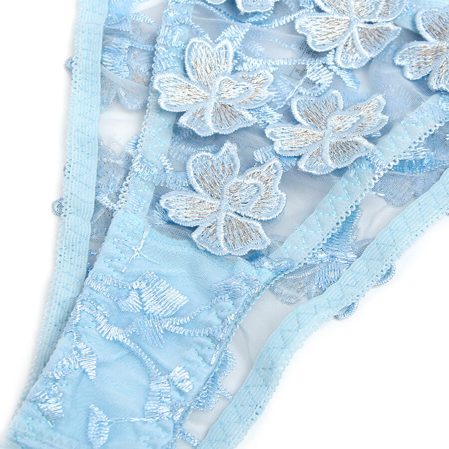 Detail de la maille bleu ciel translucide Subblime ornee de fleurs brodees en relief, finition couture du string presentee a plat sans mannequin.