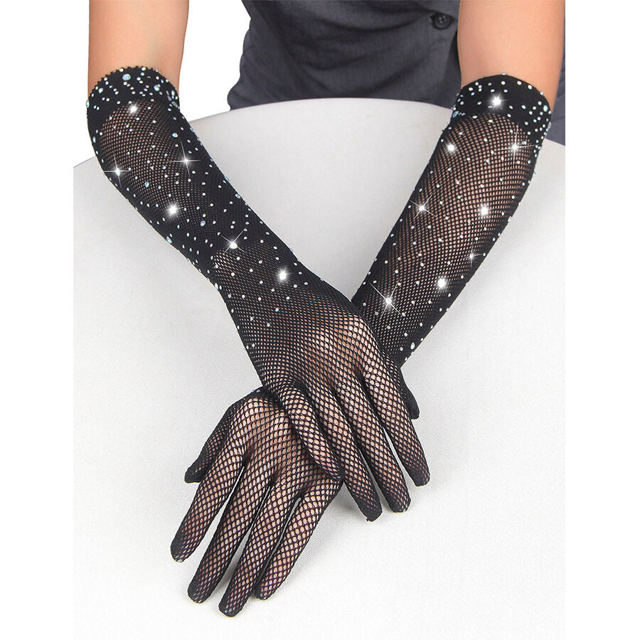Gants longs noirs a strass Subblime presentes sur des mains posees a plat : tulle resille fin transparent parseme de diamants fantaisie, accessoire glamour scintillant.