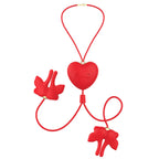 Pinces à tétons magnétiques à vibration forme papillon rouges