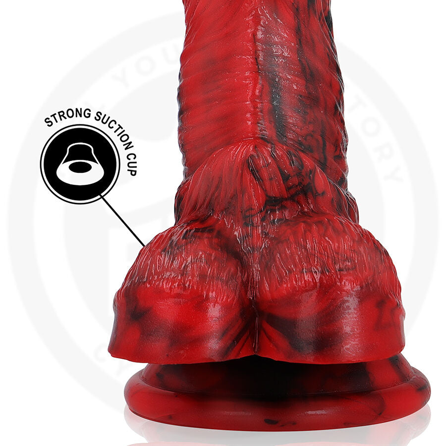 Detail de la base anatomique rouge et noir du gode fantaisie, bourse moulee et pictogramme strong suction cup, silicone flexible pour fixation ferme.