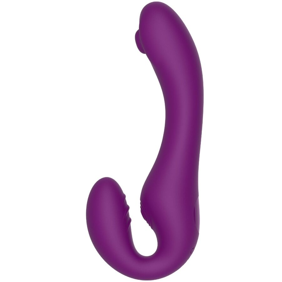 Gode-ceinture sans bretelles violet vu de profil, longue tige incurvee et branche interne en silicone lisse, design ergonomique porte sans harnais.
