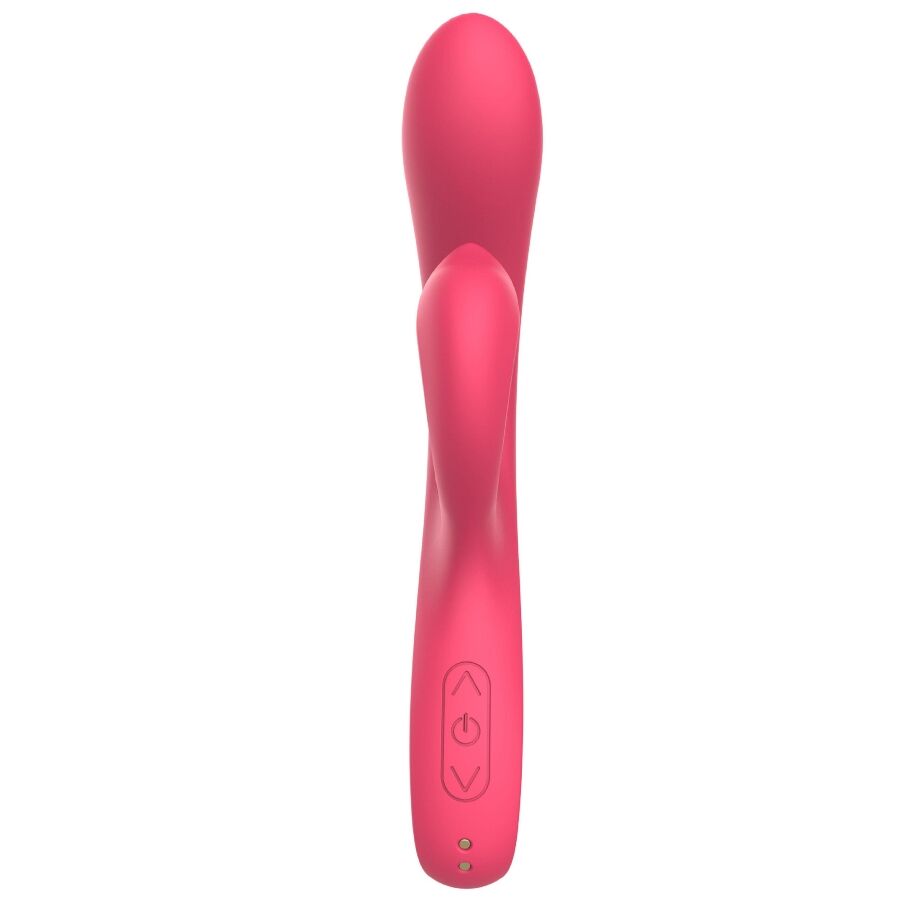 Vibromasseur point G pliable Xocoon en silicone rose, tige interne droite et bandeau de commandes a la base, stimulation clitoridienne simultanee et souple.