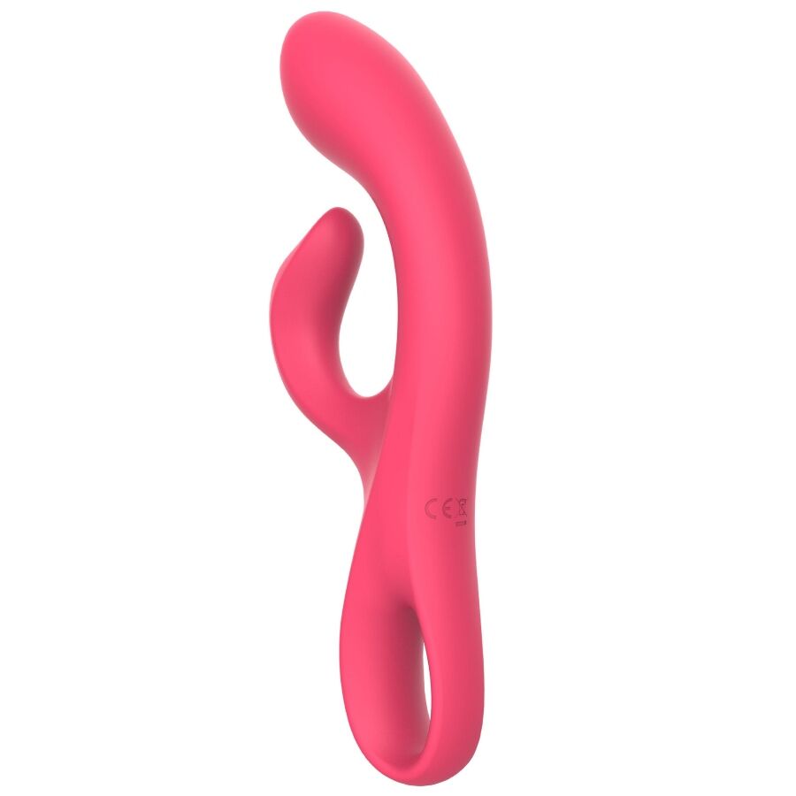 Vibromasseur point G pliable Xocoon en silicone rose vif sous un autre angle, tige allongee et bras clitoridien recourbe, design flexible et rechargeable USB.