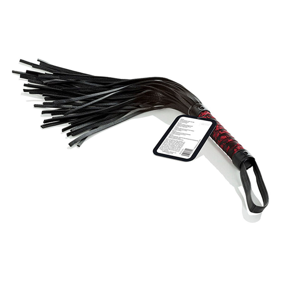 Martinet à pompons doux poignée robuste — vue de profil
