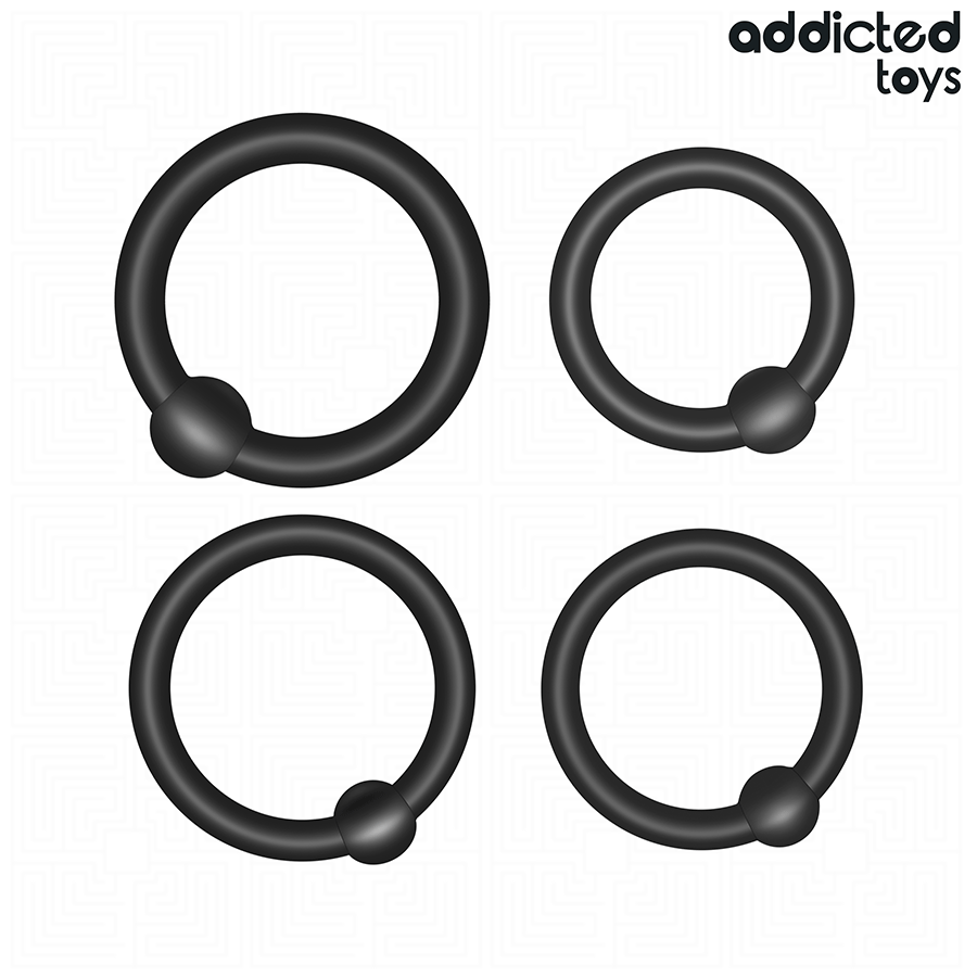 Lot de quatre anneaux peniens ronds en silicone noir Addicted disposes ensemble, cockrings souples a pression en plusieurs diametres pour le maintien de l'erection.