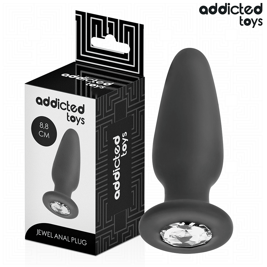 Plug anal bijou Addicted en silicone noir 8,8 cm avec cristal scintillant a la base, presente pres de sa boite, forme effilee pour une insertion douce et un maintien sur.