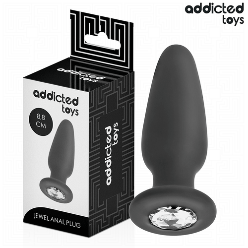 Plug anal bijou Addicted en silicone noir 8,8 cm avec cristal scintillant a la base, presente pres de sa boite, forme effilee pour une insertion douce et un maintien sur.