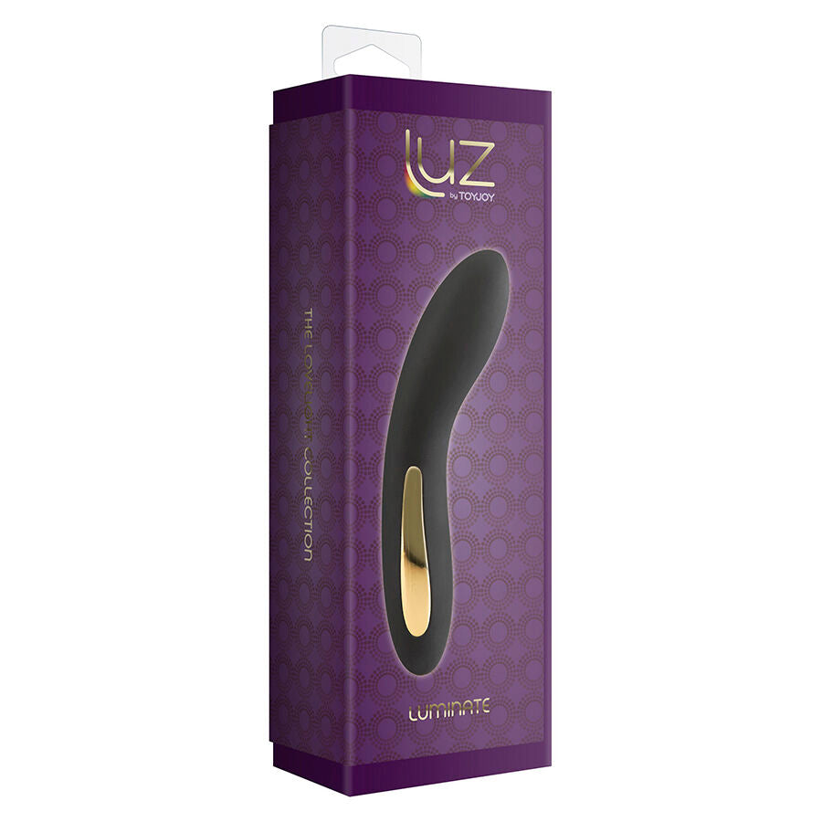 Boite violette Luz by Toy Joy du vibromasseur point G Luminate, packaging premium montrant le stimulateur noir et dore, gamme lumiere d'ambiance rechargeable.