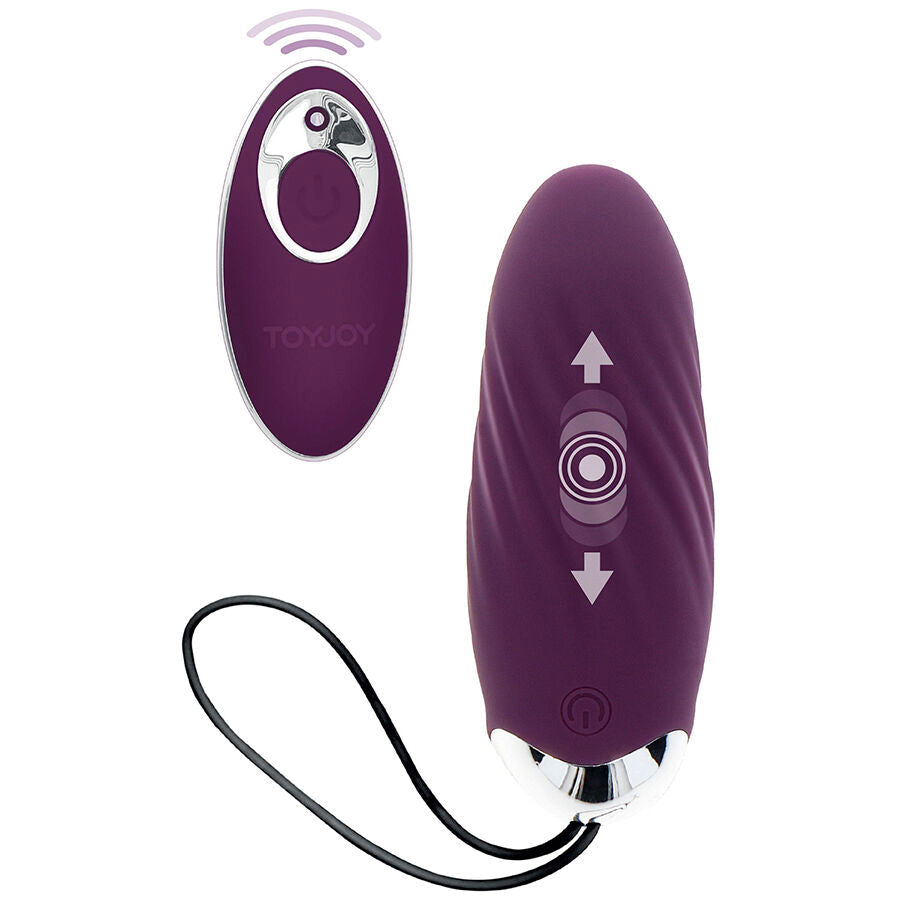 Oeuf vibrant violet fonce en silicone a surface striee et sa telecommande a fleches, cordon de rappel. Stimulateur a 8 modes rechargeable pour plaisir mains libres.