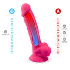 Schéma thermoréactif du gode réaliste vibrant rose Silexd : dégradé bleu-rouge illustrant le silicone ferme au froid et souple au chaud — visuel pédagogique sextoy télécommandé