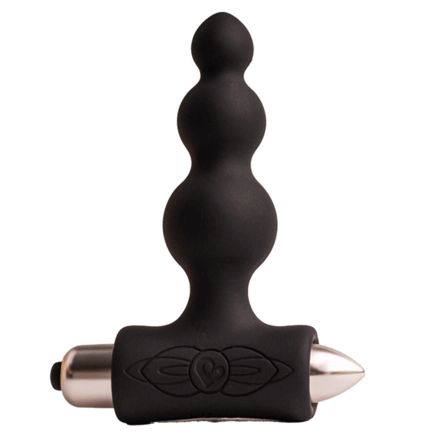 Plug anal noir à billes progressives empilées sur une base vibrante en T à embout métallisé, présenté seul sur fond clair, silicone lisse non figuratif.