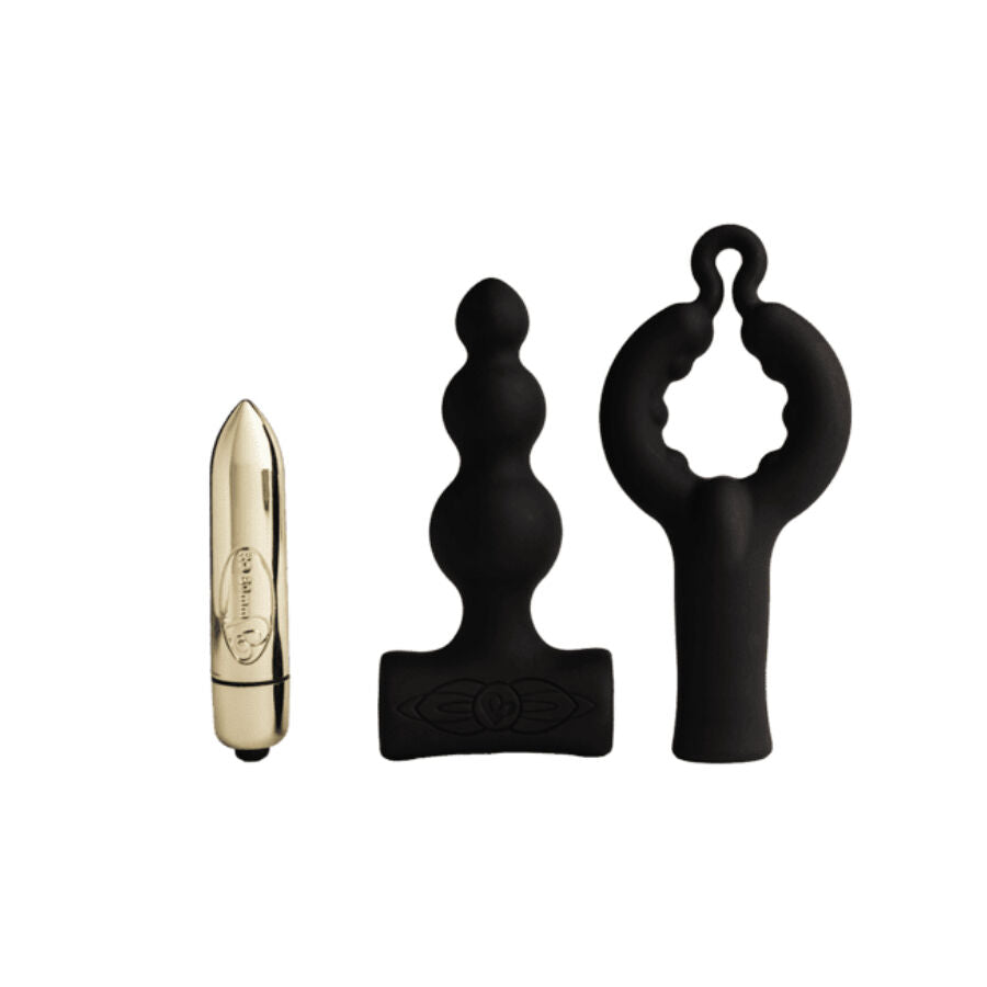 Trio posé seul : bullet doré, plug anal à billes noir et embout en T ouvert, montrant les composants amovibles en silicone et métal sur fond blanc épuré et neutre.