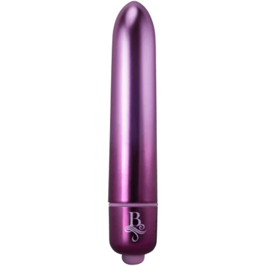 Bullet vibrant violet métallisé dressé sur sa base à embout coloré, pointe arrondie et logo Rocks-Off, mini vibromasseur clitoridien compact à finition brillante.